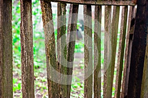 Old wooden fence. Broken wooden fence. Old boards.