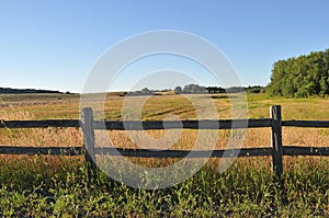 Old wooden fence in a rural field