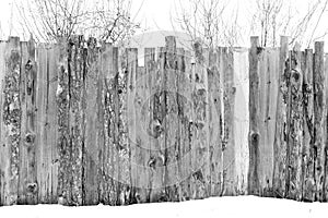 Old wooden fence in a russian village