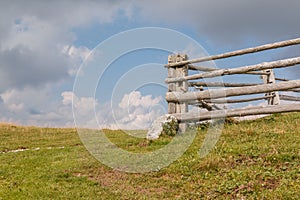 Old wooden fence surrounded by sky
