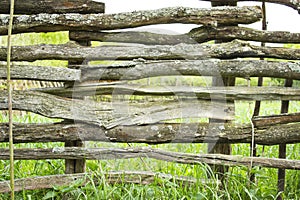 Old wooden fence in the village. Rural life of people in nature