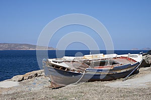 Old wooden fisher boat photo