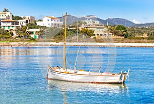 Old wooden fishing boat at bay of Porto Petro, Majorca Spain