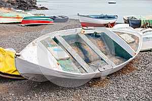 Old wooden fishing boat on the coast