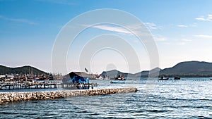 Old wooden fishing boats moored in Chonburi