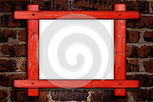 Old wooden frame against a brick wall with copy space in the centre
