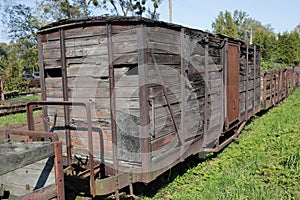 Old wooden freight wagon. Part of destroyed train