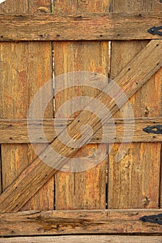 Old Wooden Gate with Black Hinges