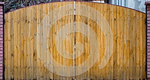 Old Wooden gate with door close up. Retro design