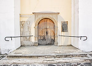 Old wooden gate with railing to the church, Trencin, Slovakia