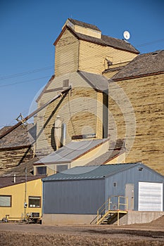 Old wooden grain elevator in the town of Skiff