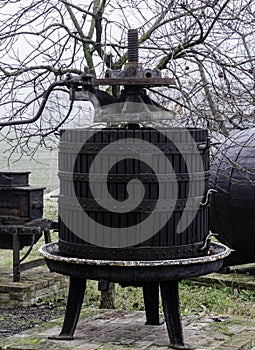 Old wooden grape mechanical press