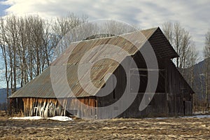 Old Wooden Hay Barn on a Farm photo