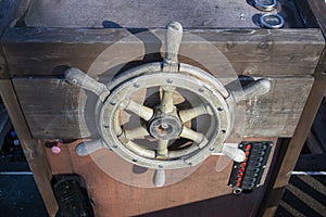 Old wooden helm of a boat