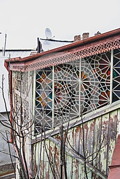 Old wooden house with mosaic windows of Tbilisi