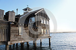 Old wooden house on sea