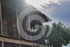 Old wooden house and sun light