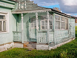 The old wooden house in the village with a verandah