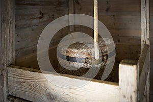 An old wooden hut and a barn made of round logs. Interior decoration.