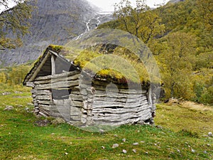 Old wooden hut in forest