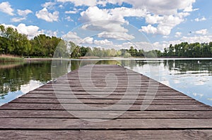 Old wooden jetty at a lake