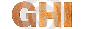 Old wooden letters GHI