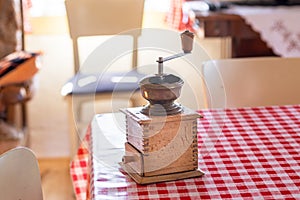 Old wooden manual coffee grinder