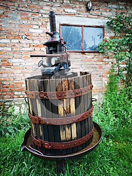 Old wooden manual press used to press the grapes and make wine