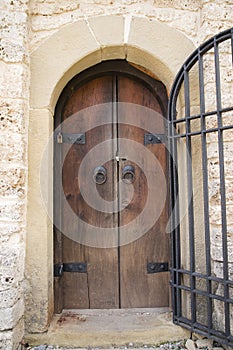 Old wooden massive door on church