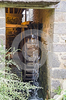 The old wooden mill wheel