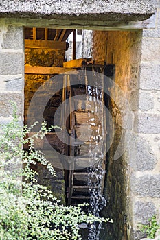 The old wooden mill wheel