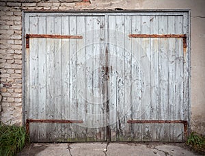 Old wooden neglected garage door