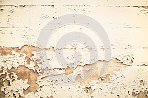 Old wooden nostalgic background with peeled color in beige. photo