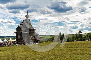 Old wooden Orthodox Christian church on the hill. Urals. Russia.