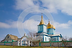 Old wooden orthodox church of moscow patriarchate, Ukraine on a beautiful sunny morning, early spring, photo