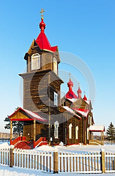 Old wooden orthodox church in the Siberian village Turnaevo