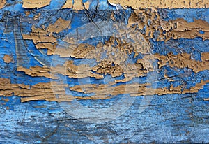 Old wooden painted blue and yellow rustic background