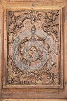 An old wooden panel with a carving of the Dodge of Venice