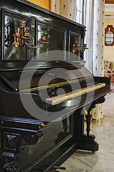 Old wooden piano from a dance hall