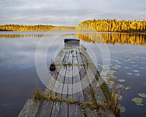 Old wooden pier at a lake