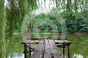 Old wooden pier on the lake