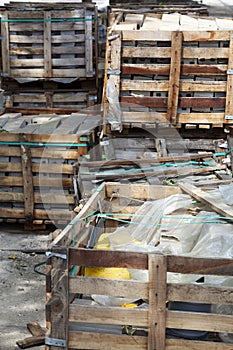 Old Wooden plank crates containing bricks