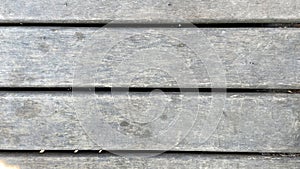 Old Wooden planks background wall. Rural wood plank fence with an old paint white color close up.