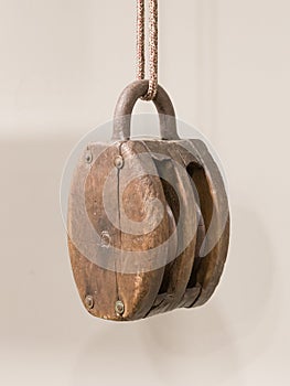 Old wooden pulley
