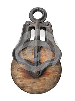 Old wooden pulley isolated.