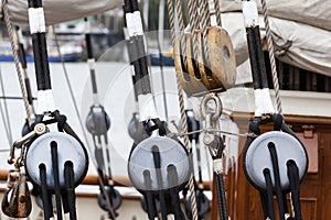 Old wooden pulley on a sailing boat
