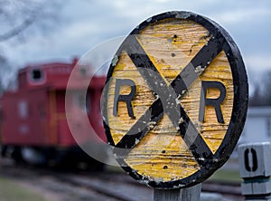 Old wooden railroad RR sign with caboose