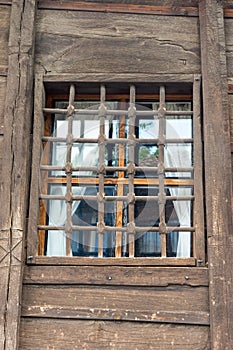 Old Wooden Reshotka on the window of the house in Koprivshtitsa, Bulgaria photo