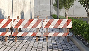 Old wooden road barrier on the sidewalk closeup. Warning sign about the closure of the passage on the road. 3D render.