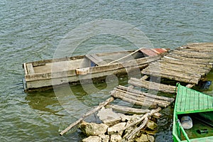 Old Wooden Rowing Fishing Boat Moored Near Lake